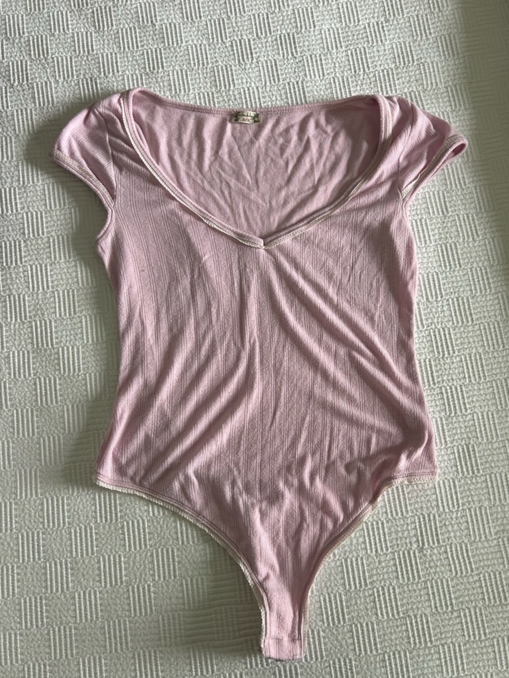 Free people pointelle bodysuit in pink size medium